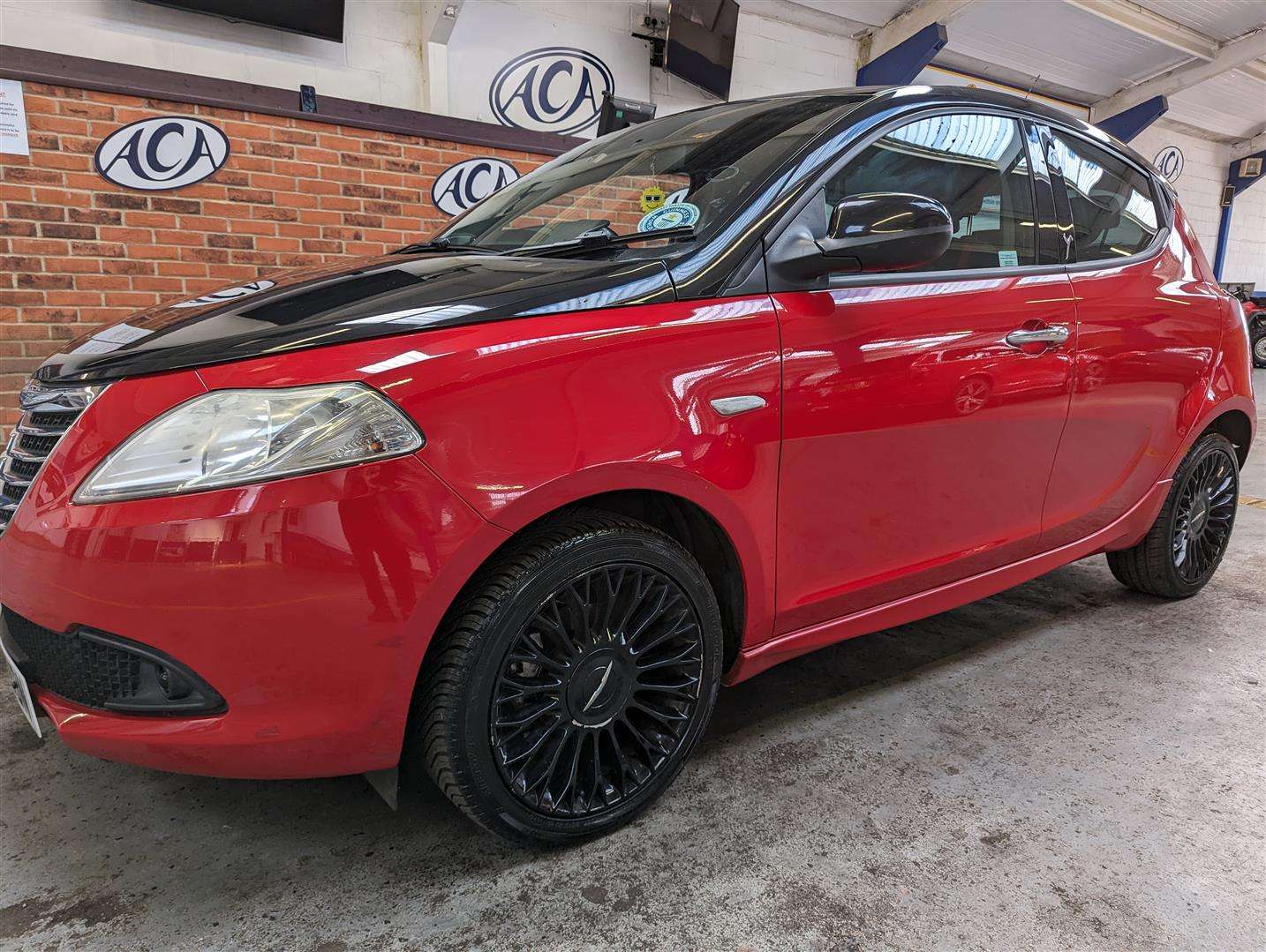 <p>2012 CHRYSLER YPSILON BLACK AND RED</p>