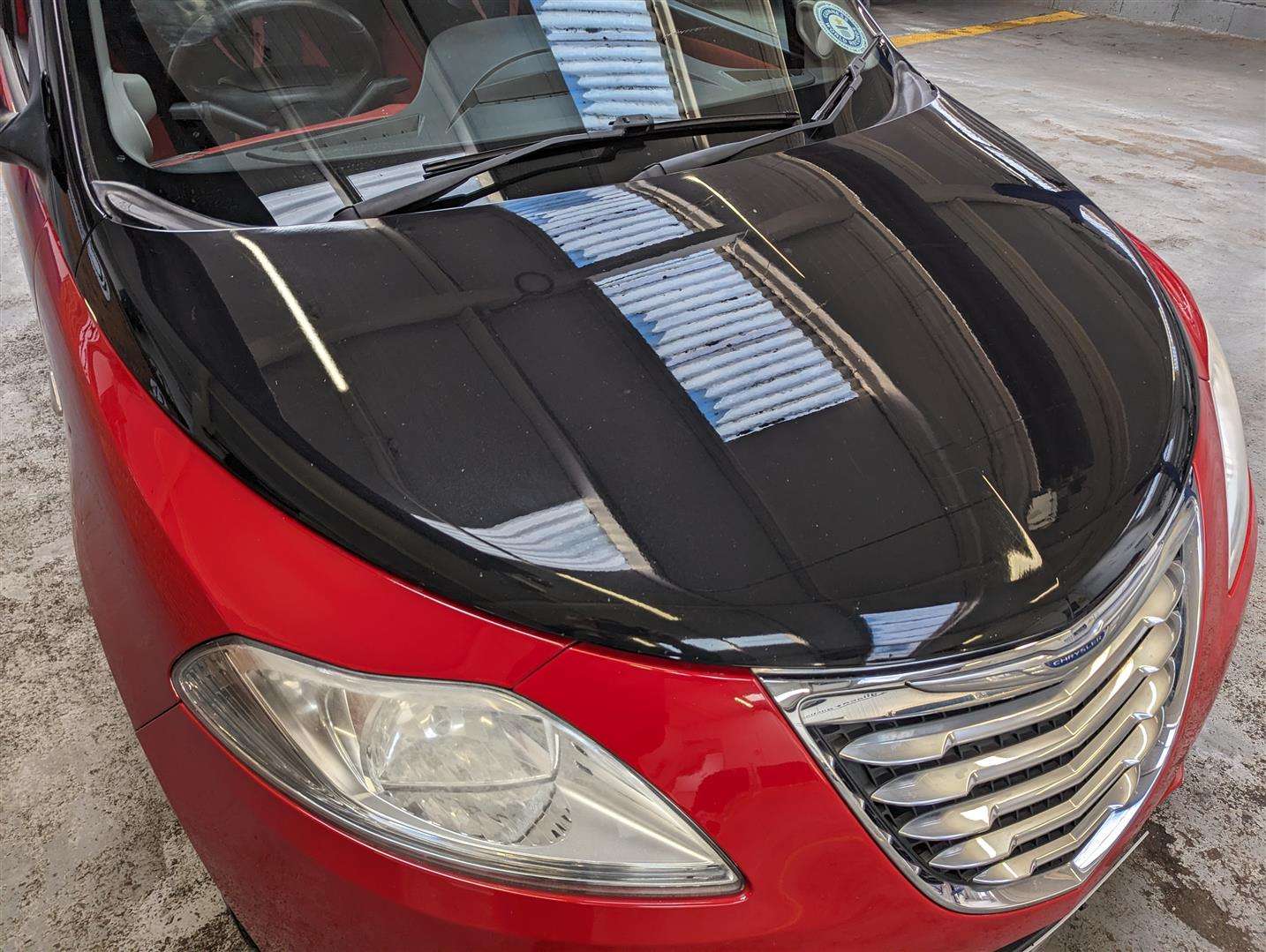 <p>2012 CHRYSLER YPSILON BLACK AND RED</p>