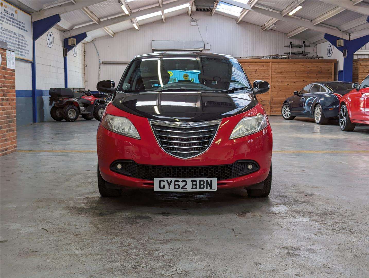 <p>2012 CHRYSLER YPSILON BLACK AND RED</p>