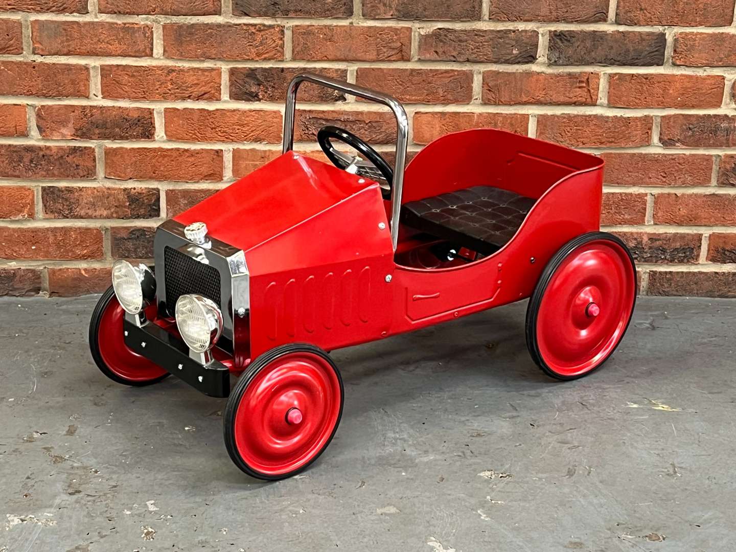 <p>Tin Plate Childs Pedal Car</p>