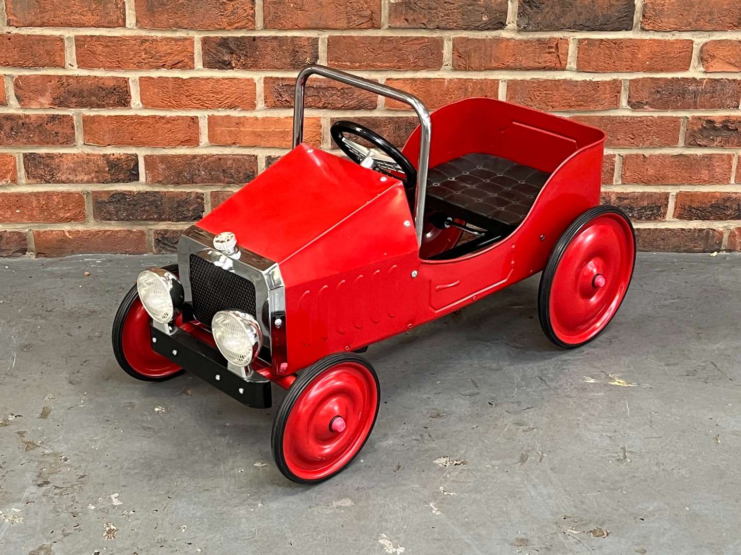 <p>Tin Plate Childs Pedal Car</p>