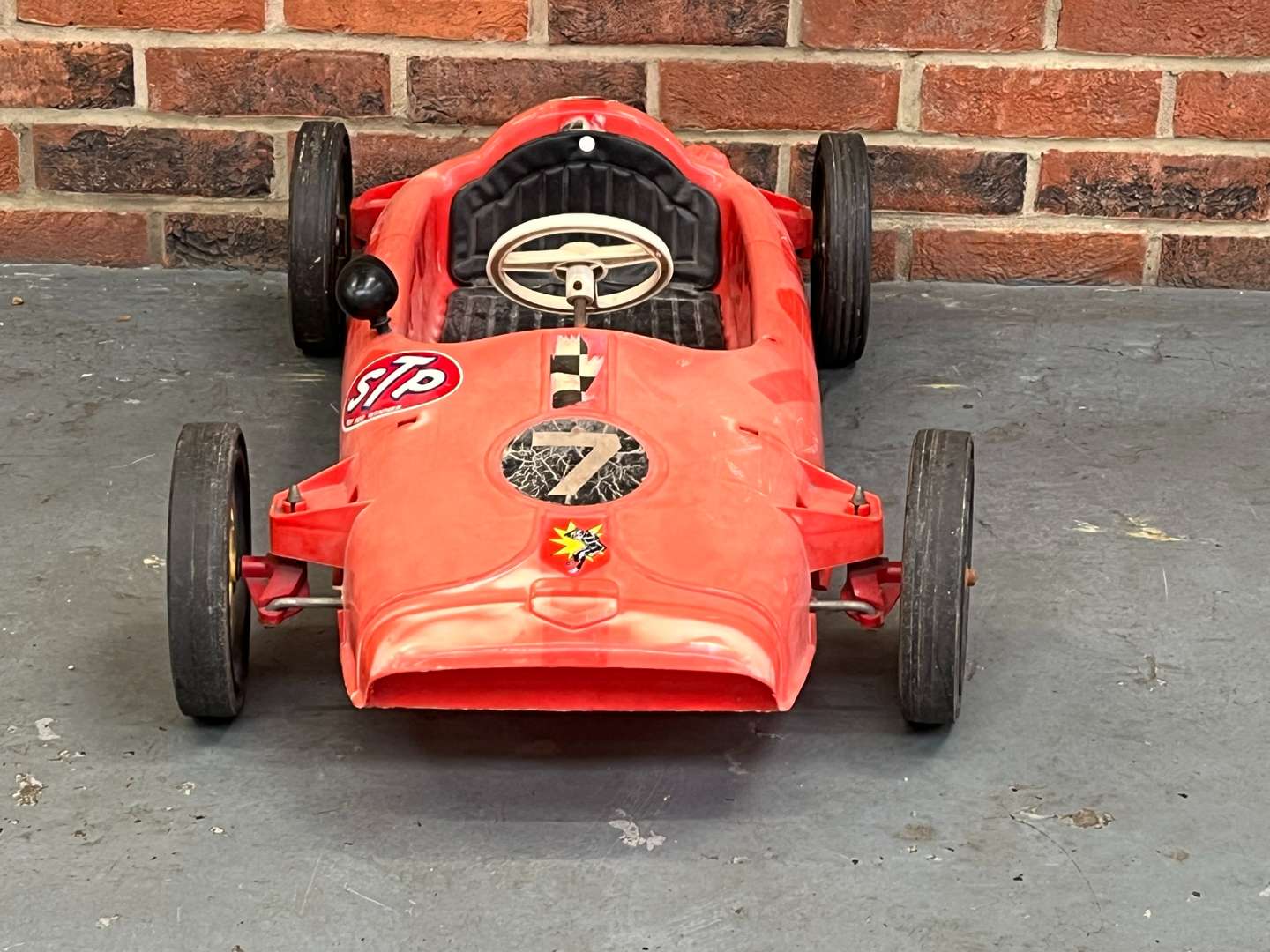 <p>Tri-Ang Plastic F1 Pedal Car</p>