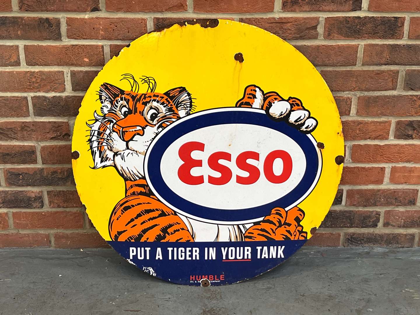 <p>Esso "Put A Tiger In Your Tank" Circular Sign</p>