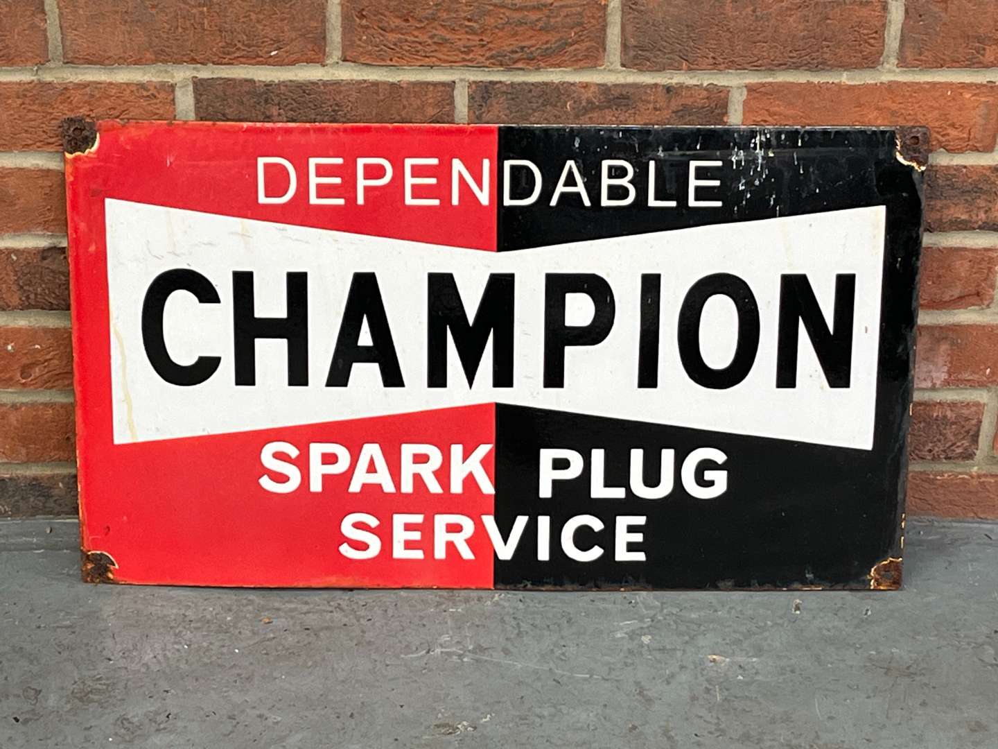 <p>Champion Spark Plug Service Enamel Sign</p>