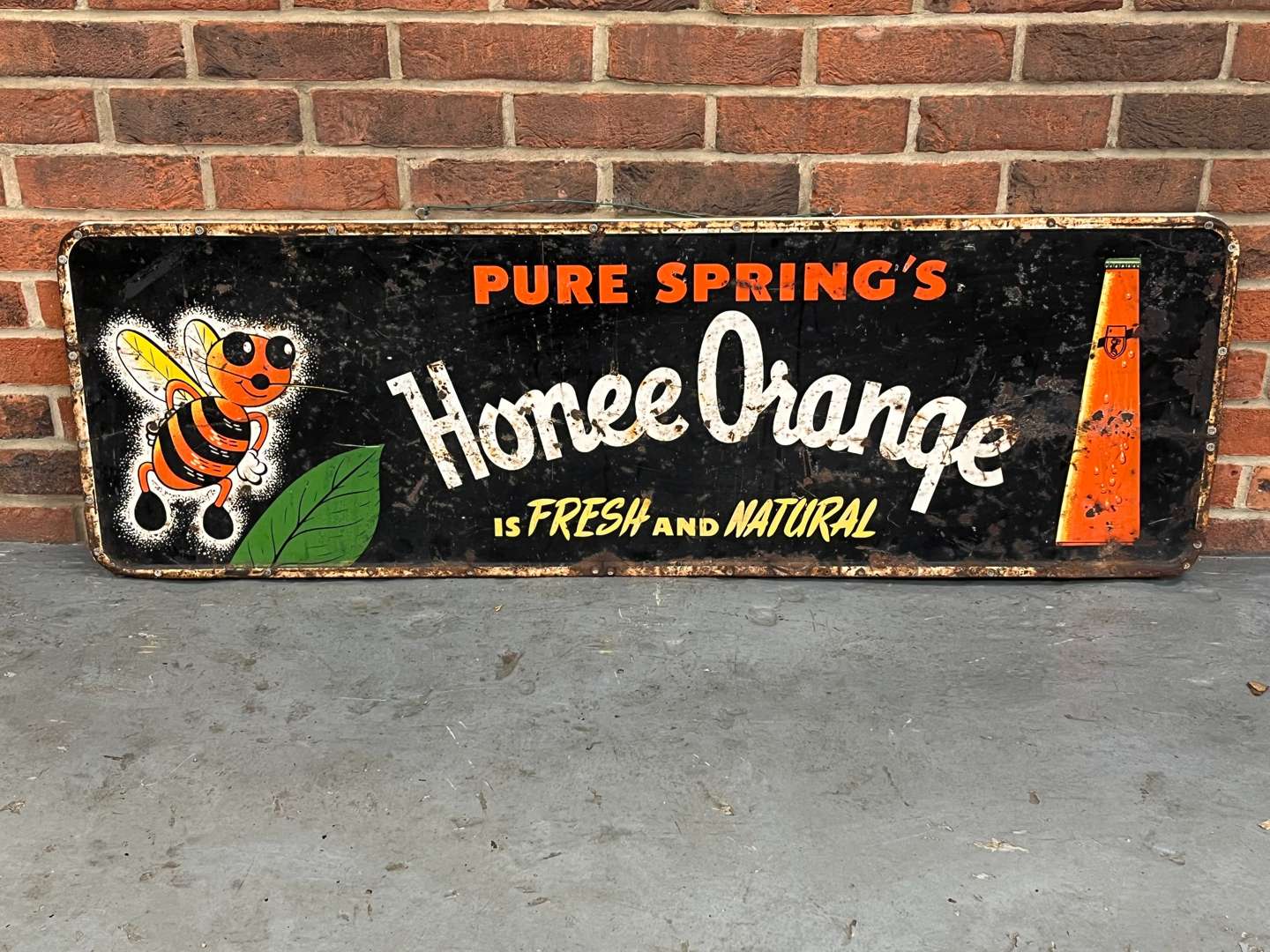 <p>Pure Springs Honee Orange Metal Sign</p>