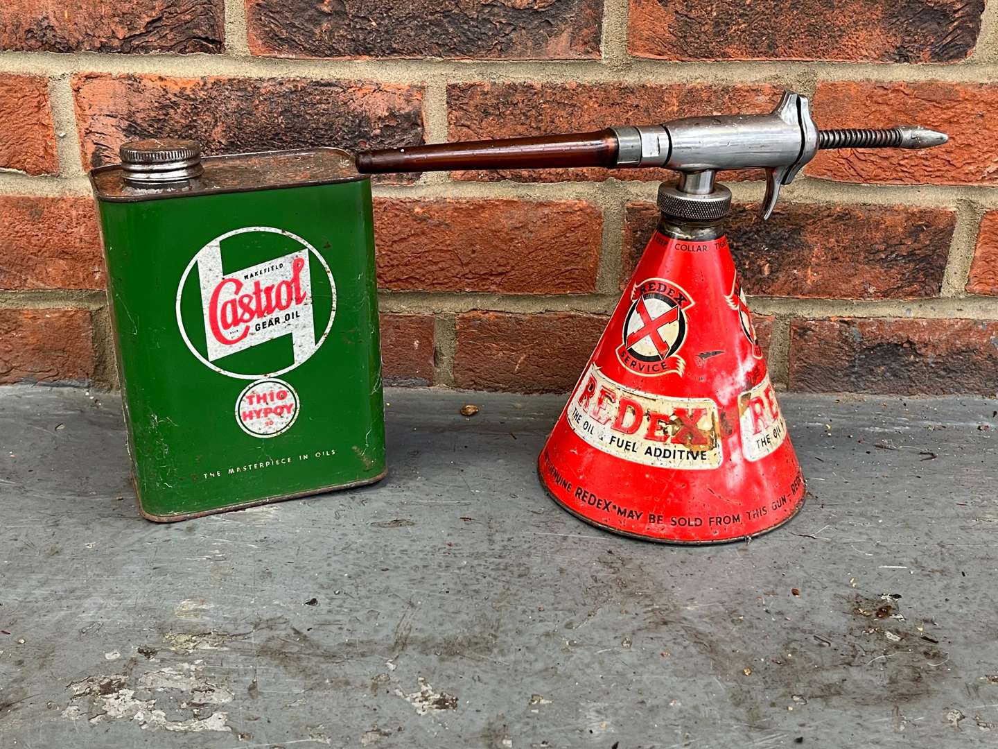 <p>Castrol and Redex Oil Cans</p>