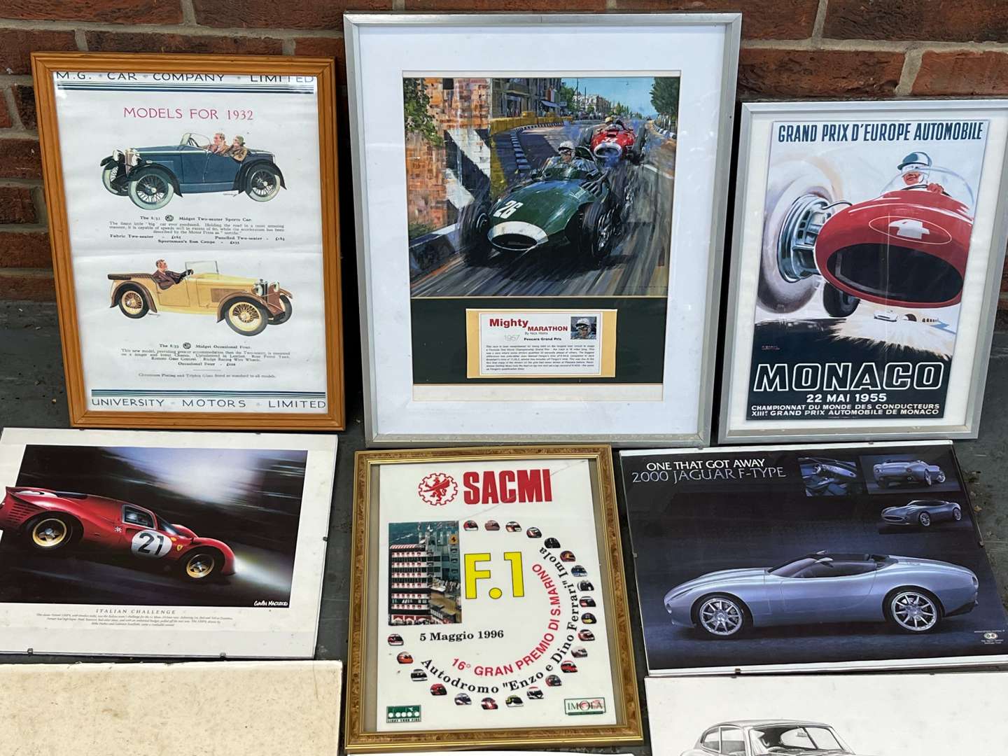 <p>Twelve Assorted Motoring Prints&nbsp;</p>