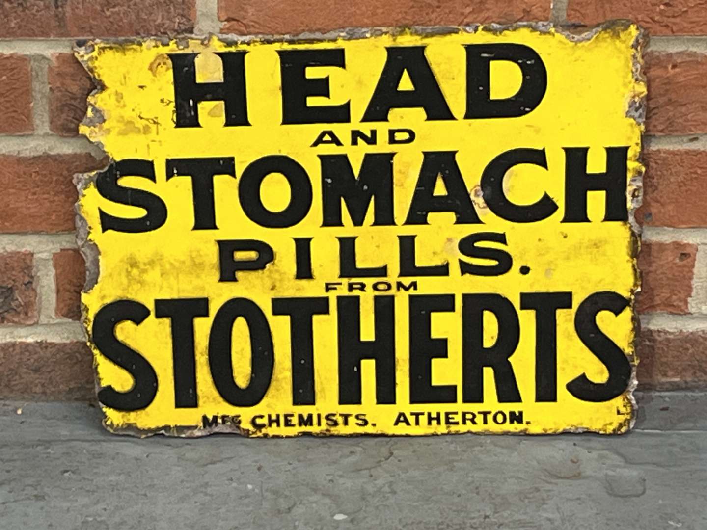 <p>Head & Stomach Pills From Stotherts Sign</p>