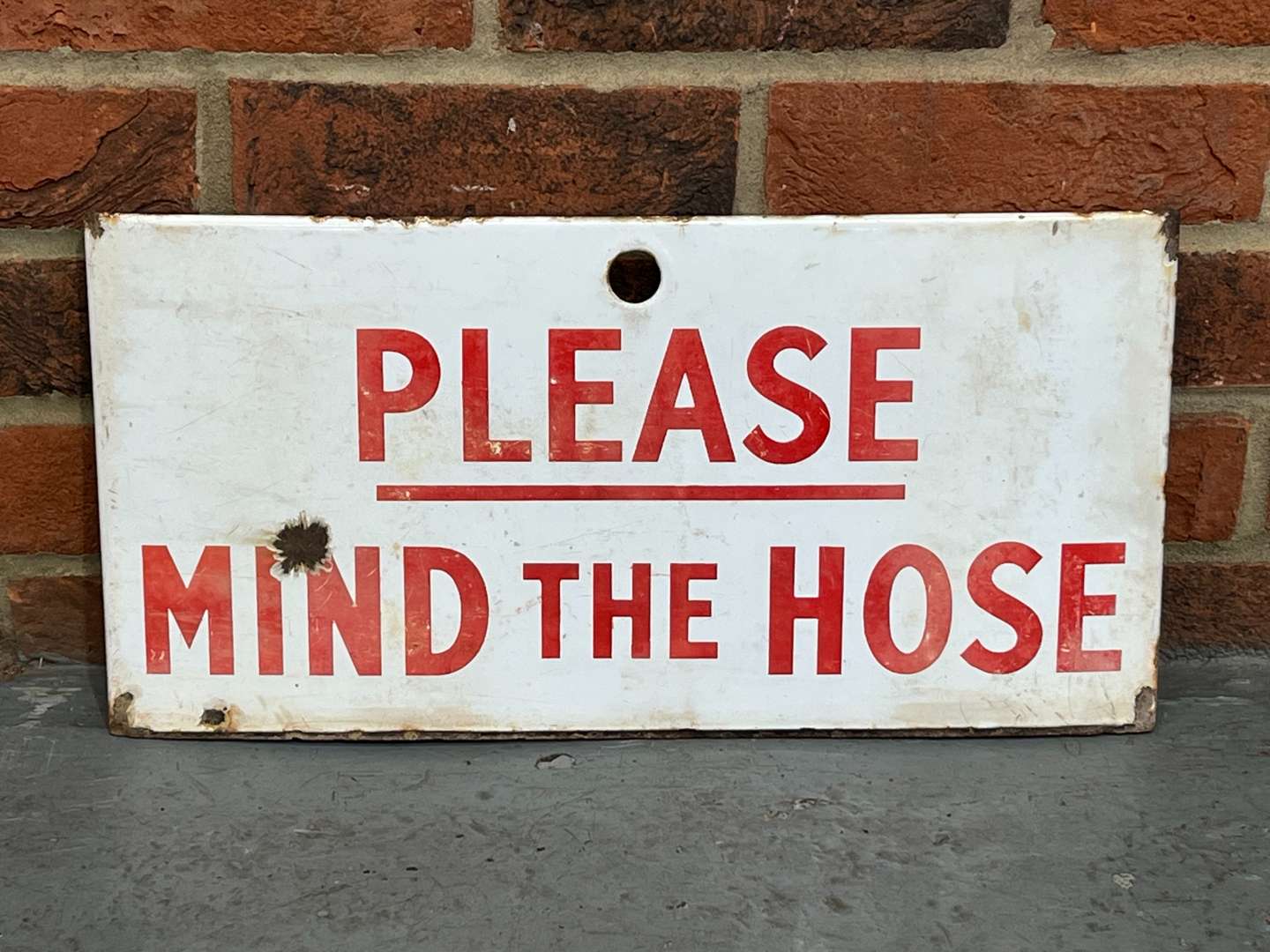 <p>Please Mind The Hose Warning Sign</p>