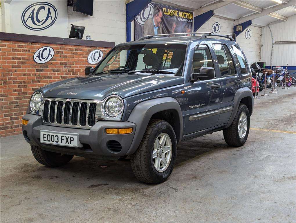 <p>2003 JEEP CHEROKEE SPORT</p>