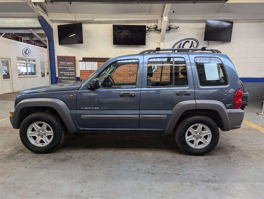 <p>2003 JEEP CHEROKEE SPORT</p>