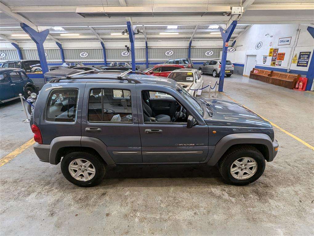 <p>2003 JEEP CHEROKEE SPORT</p>