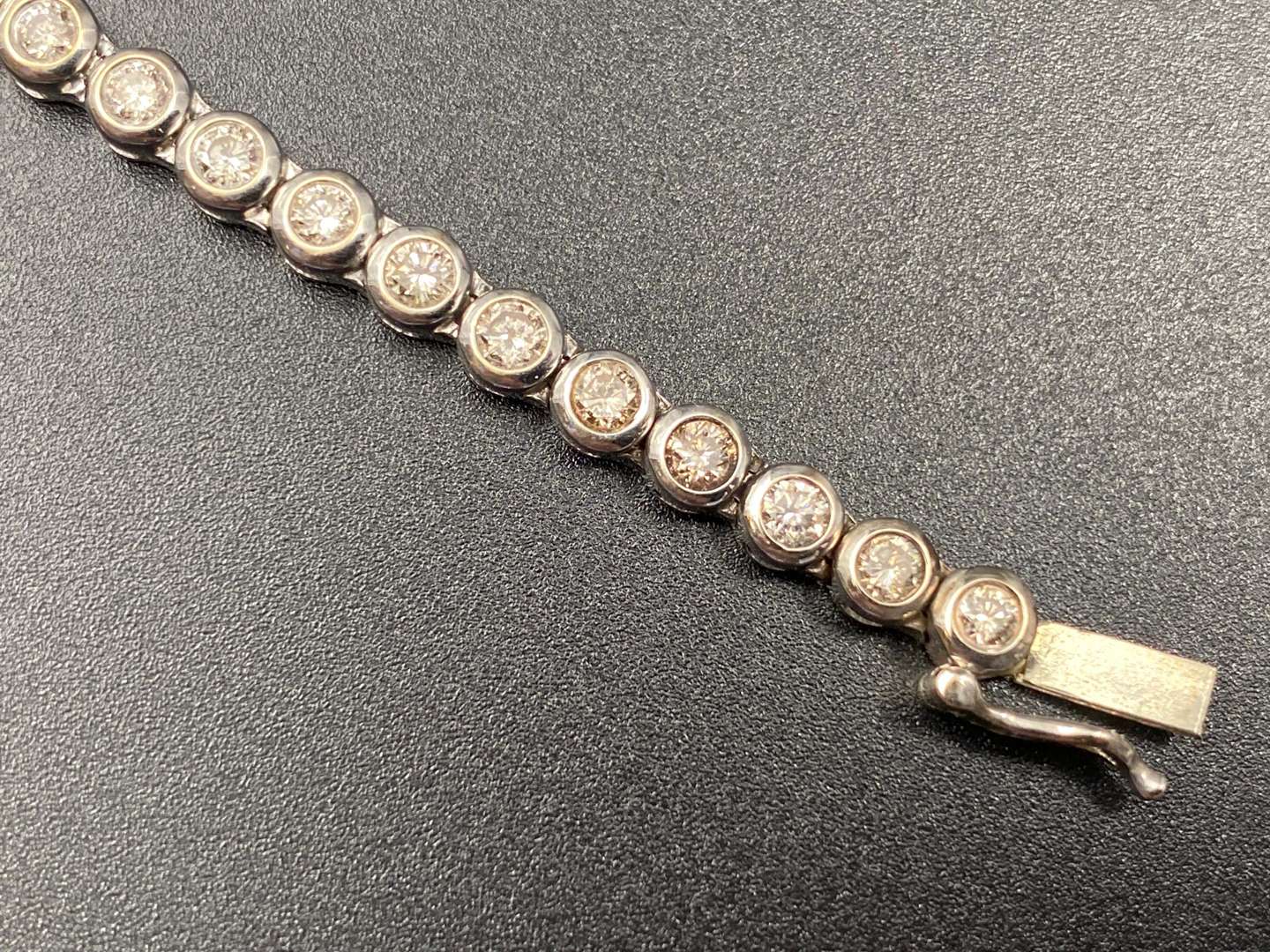 <p>A Diamond & 18ct white gold “Tennis” bracelet</p>