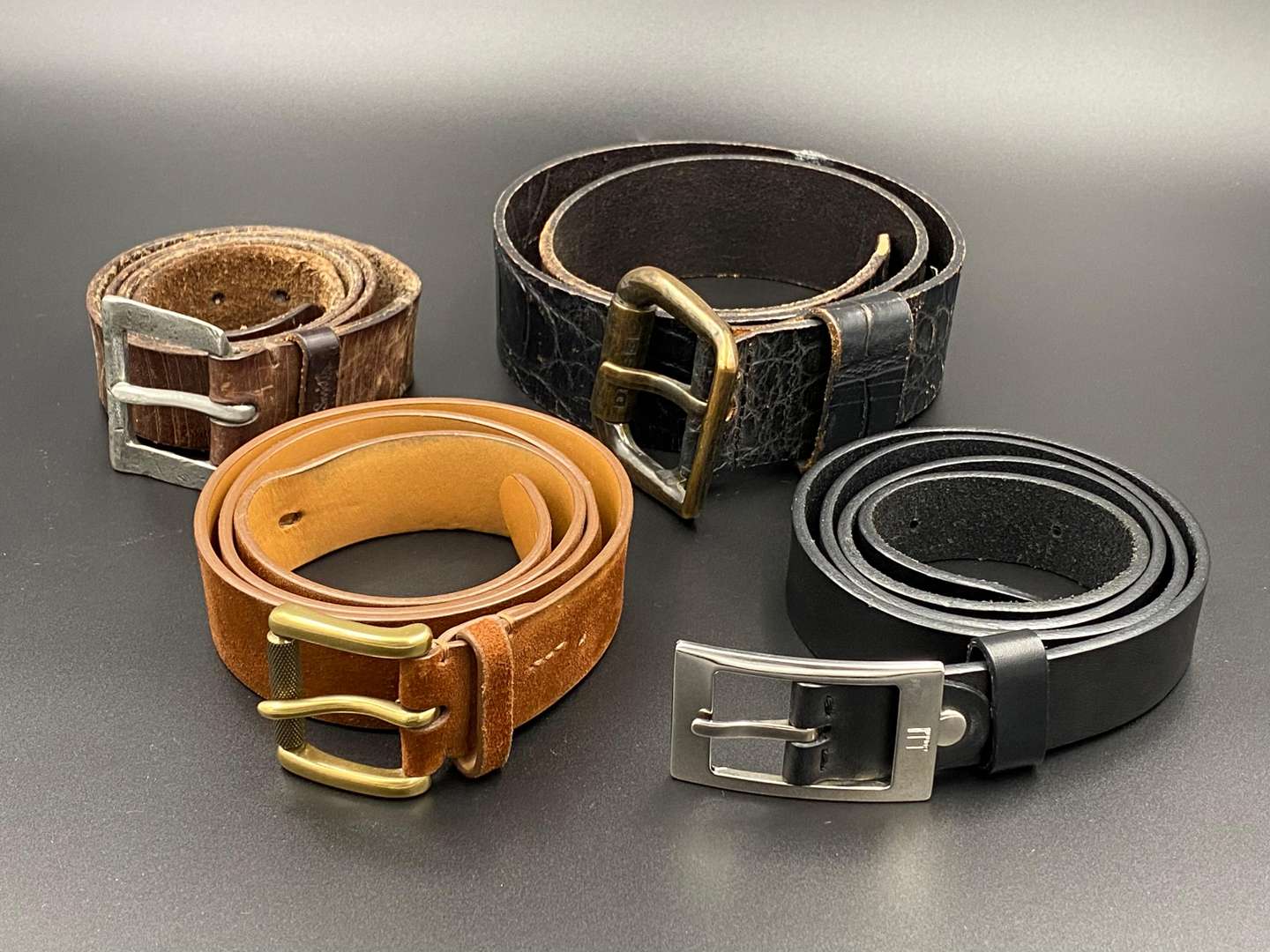 <p>4 leather belts, Dunhill, Ralph Lauren, Diesel & Paul Smith</p>