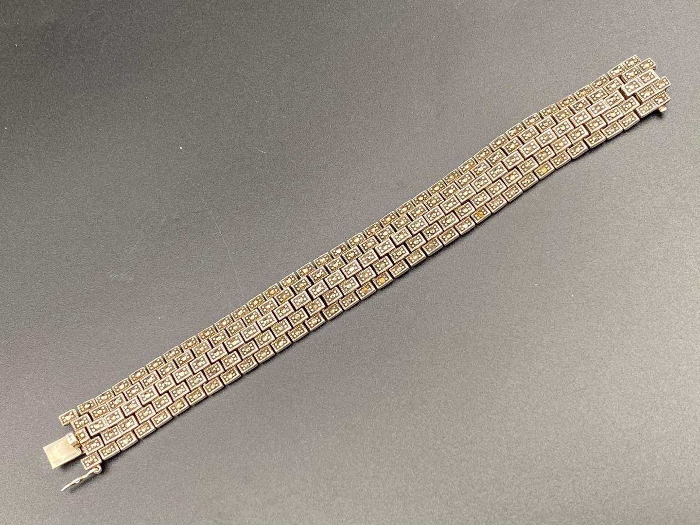 <p>An early 20th century, continental silver and Marcasite bracelet,</p>