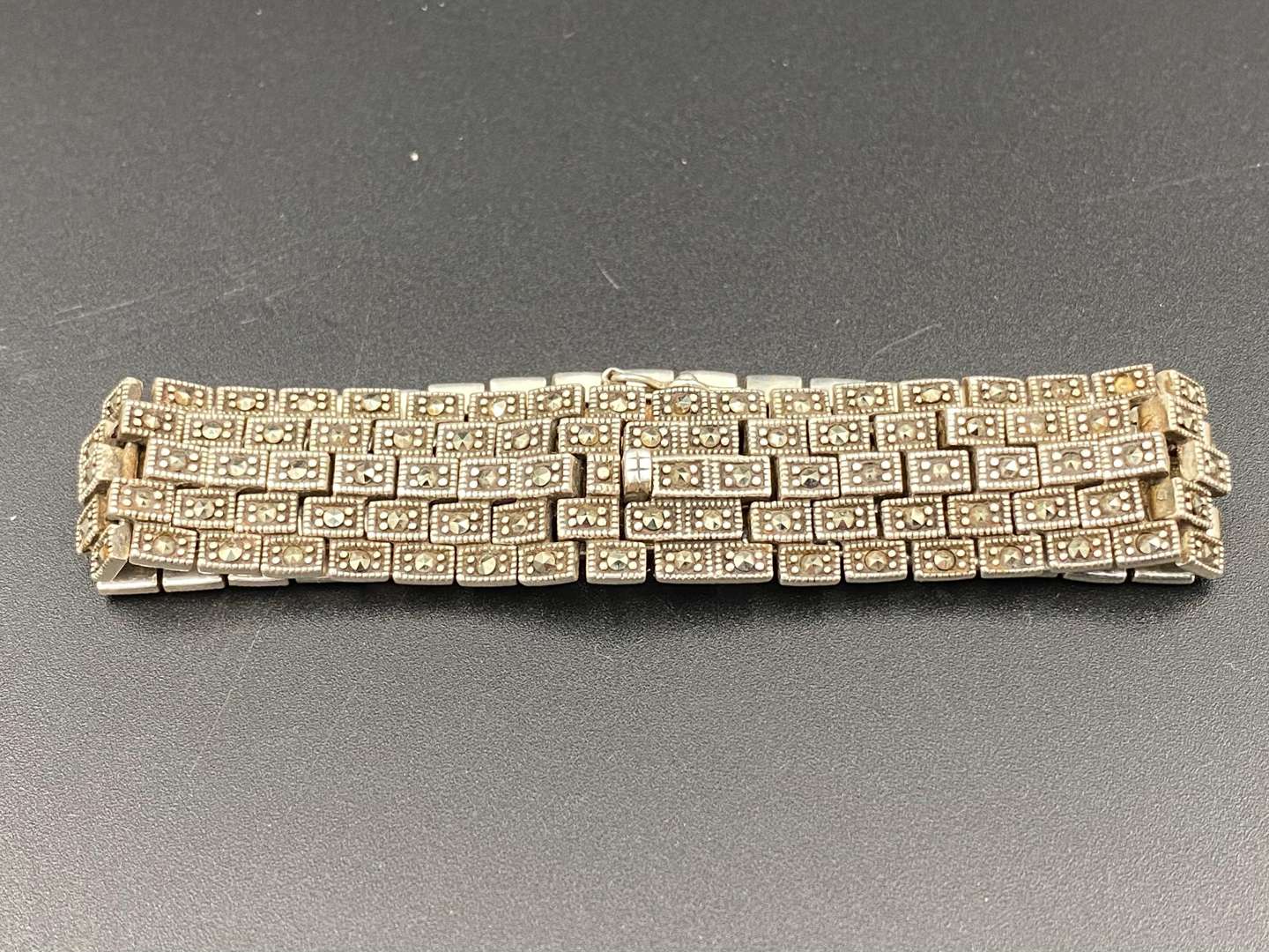 <p>An early 20th century, continental silver and Marcasite bracelet,</p>