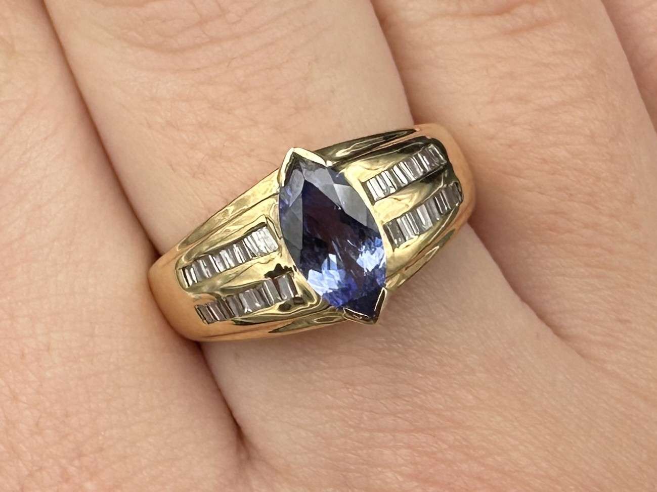 <p>Tanzanite and Diamond 14ct Gold Ring</p>