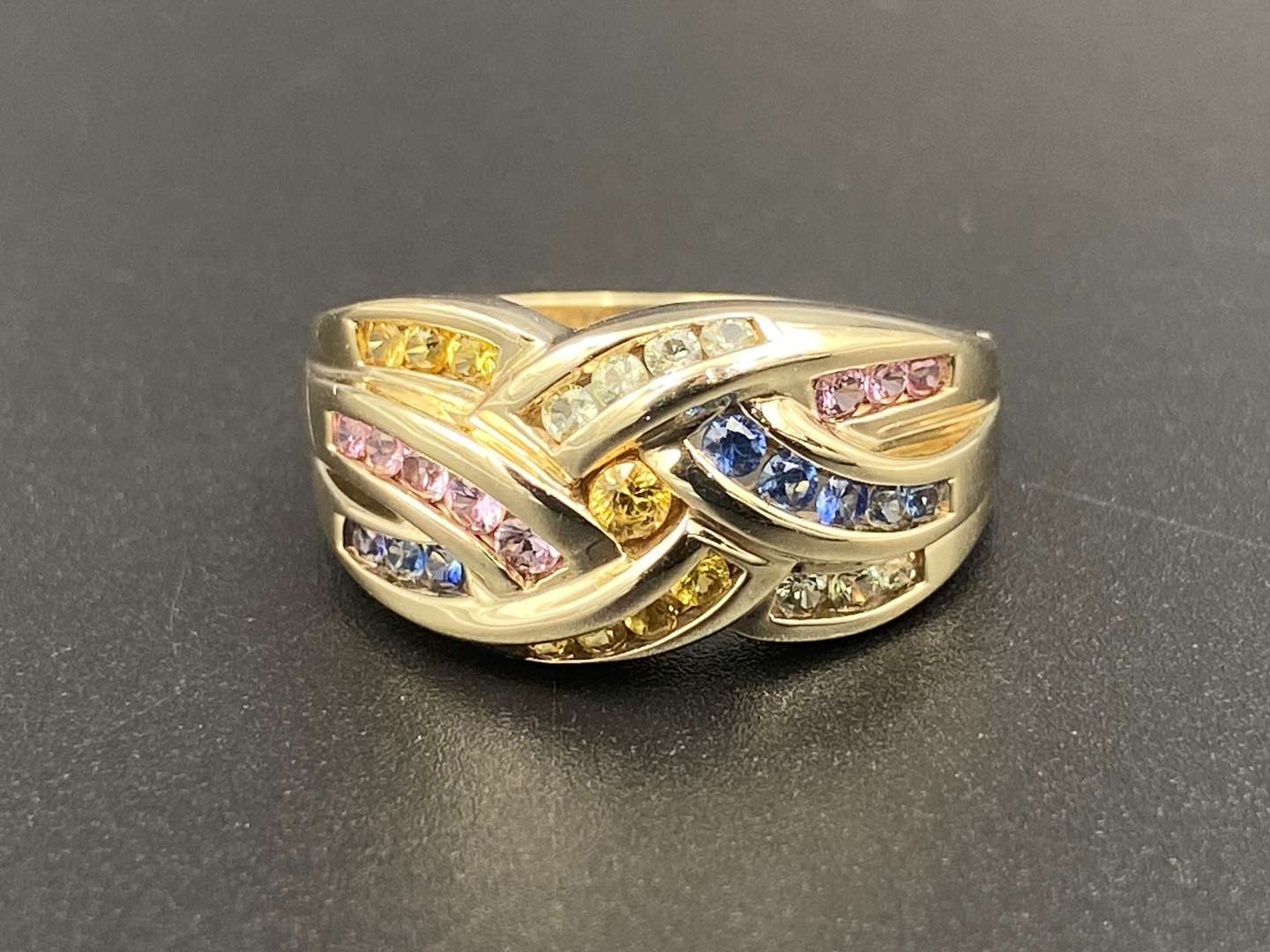 <p>A multi Sapphire 9ct gold ring</p>