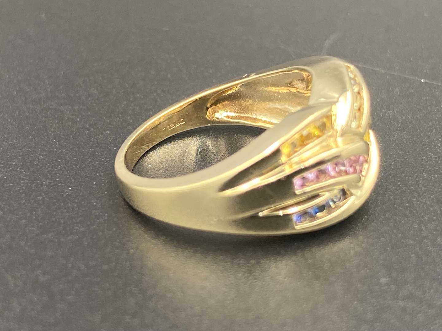 <p>A multi Sapphire 9ct gold ring</p>