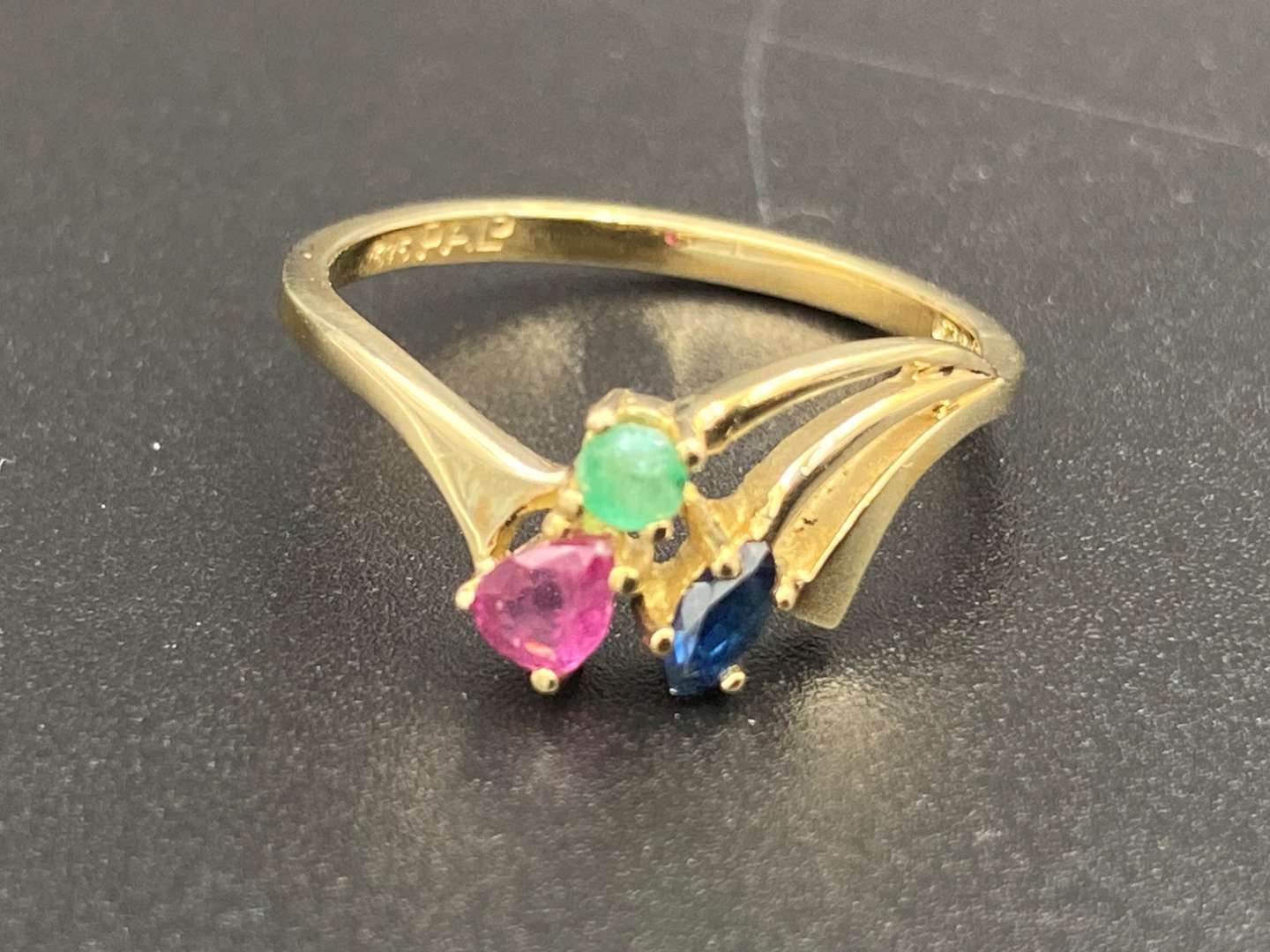 <p>An Emerald Ruby & Sapphire 9ct gold ring</p>