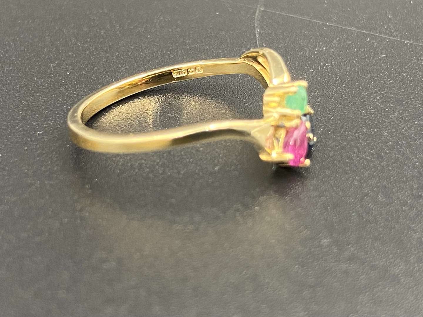 <p>An Emerald Ruby & Sapphire 9ct gold ring</p>