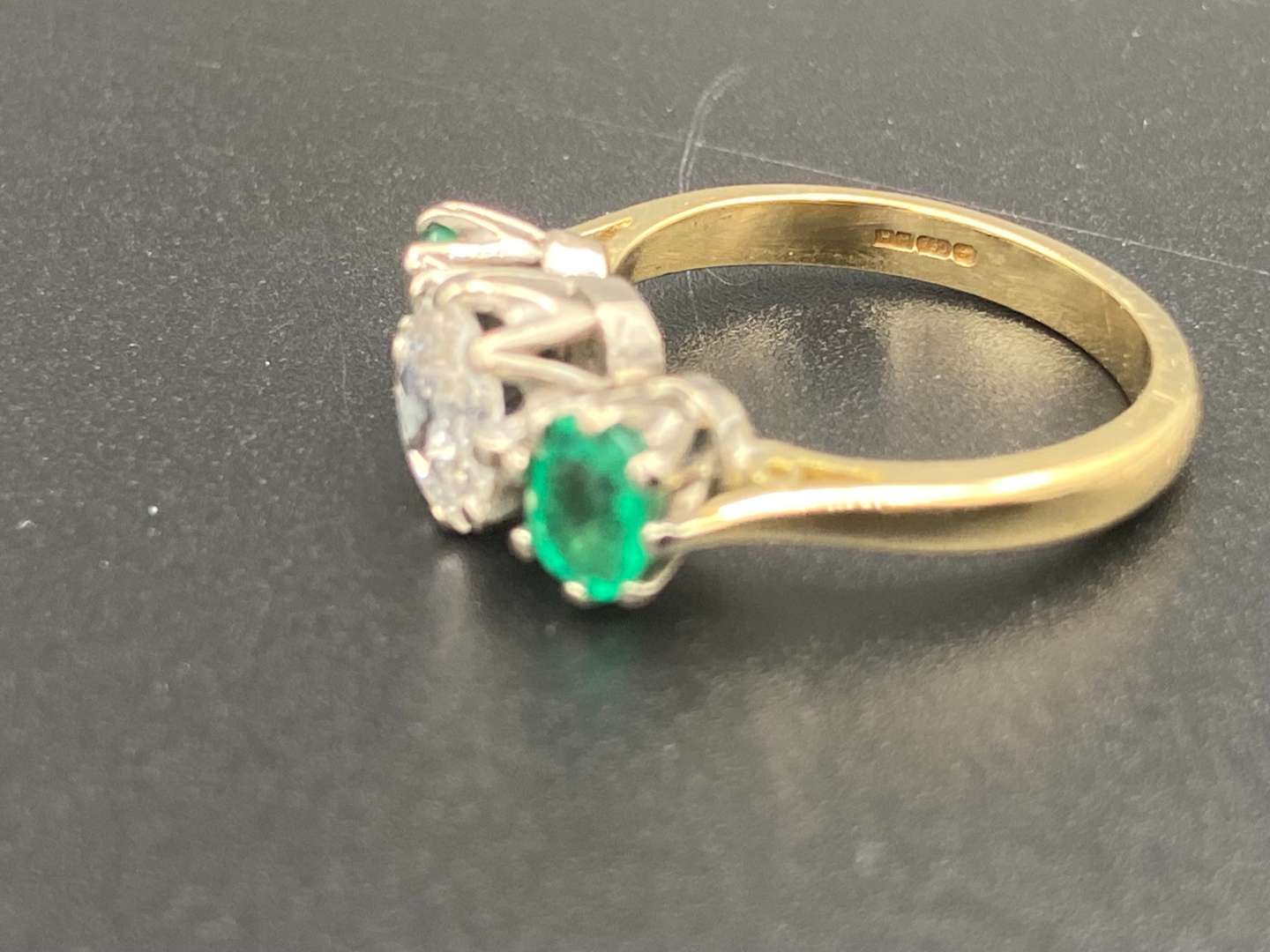 <p>Diamond & Emerald 3 stone 18ct gold ring</p>