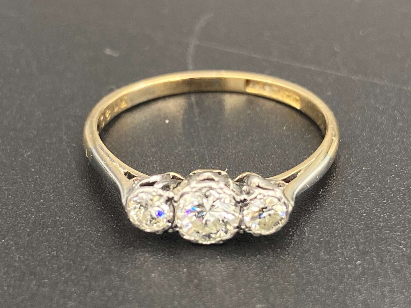 <p>Three stone Diamond 18ct gold ring</p>