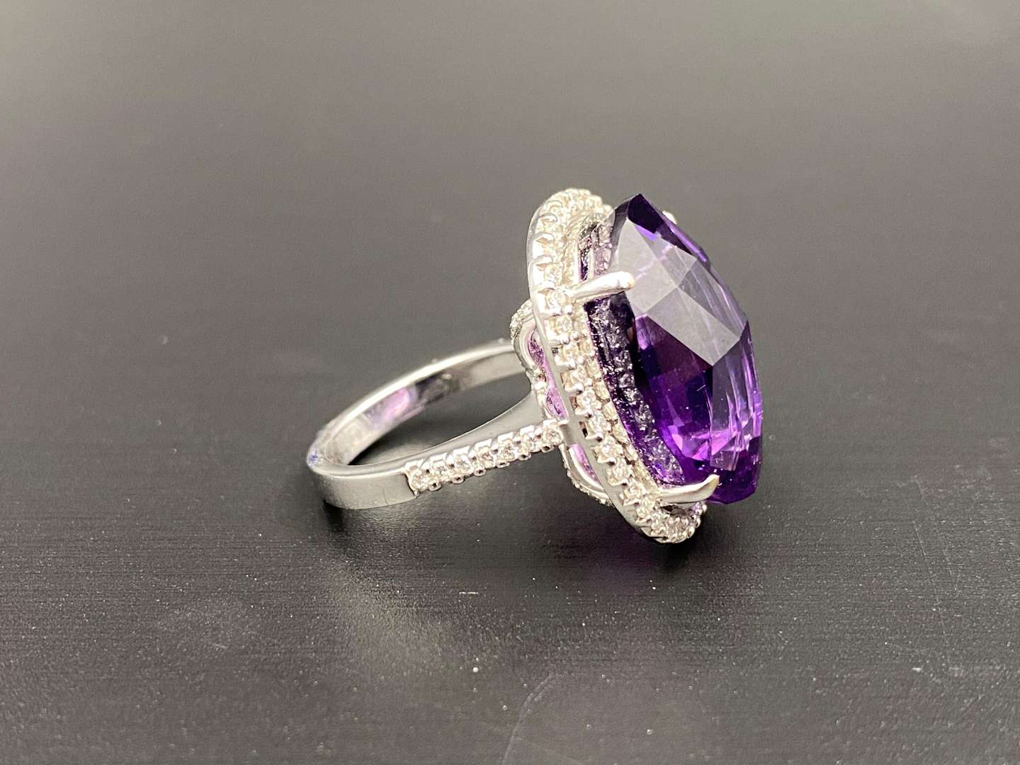 <p>Amethyst & Diamond oval 18ct white gold ring</p>