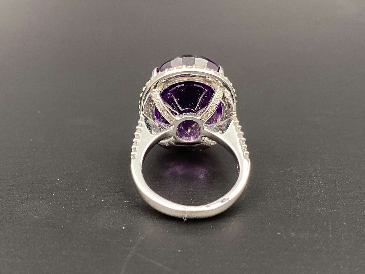 <p>Amethyst & Diamond oval 18ct white gold ring</p>