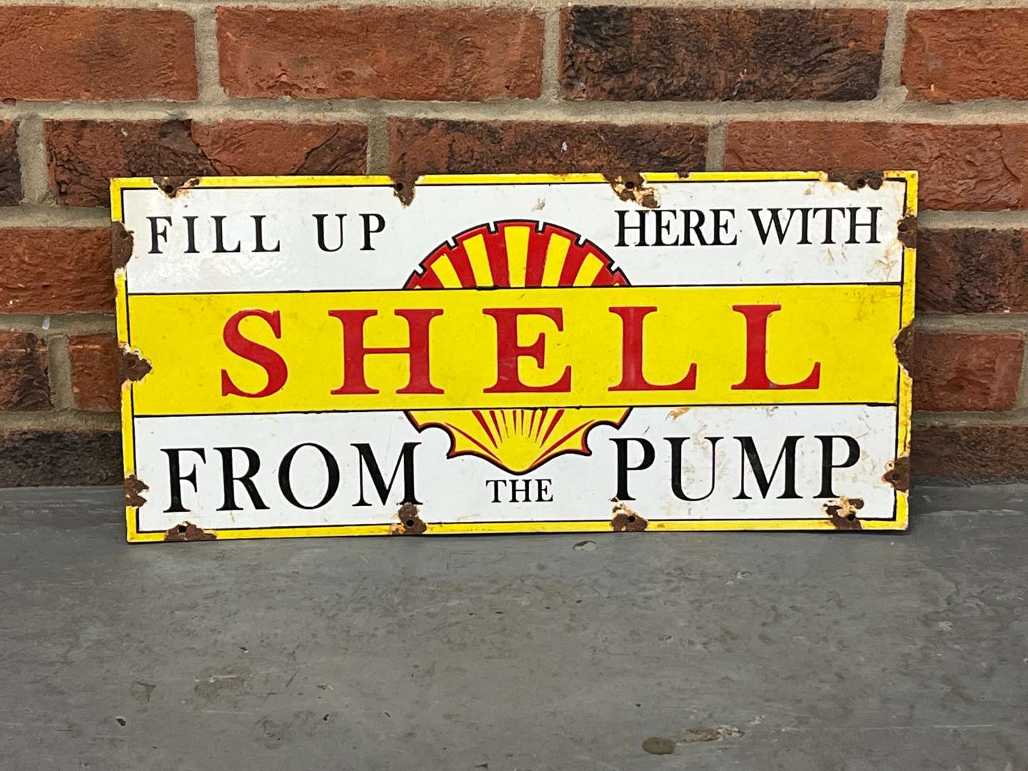 <p>Fill Up Here Wit Shell From The Pump Enamel Sign&nbsp;</p>