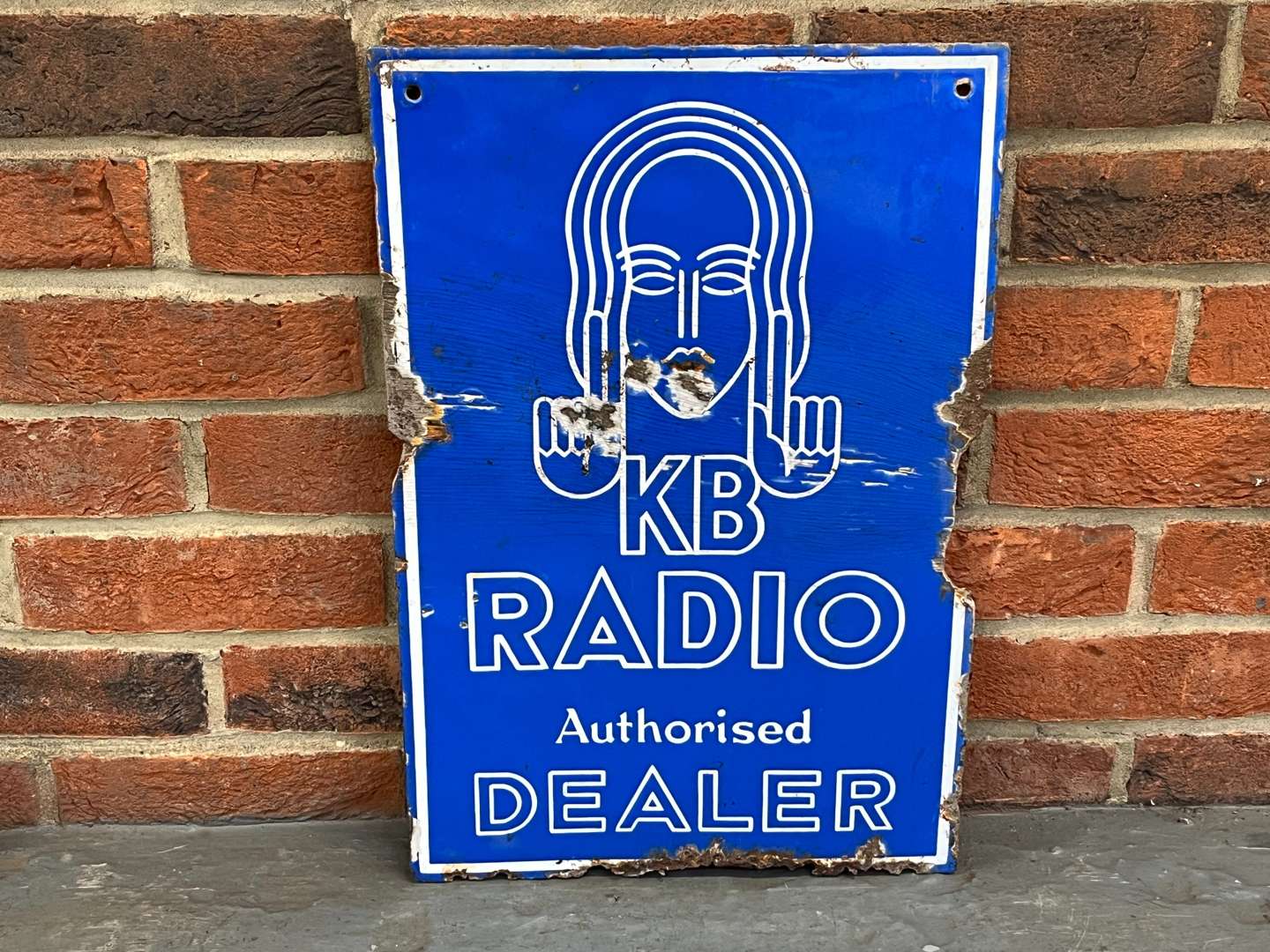 <p>KB Radio Authorised Dealer Enamel Sign</p>