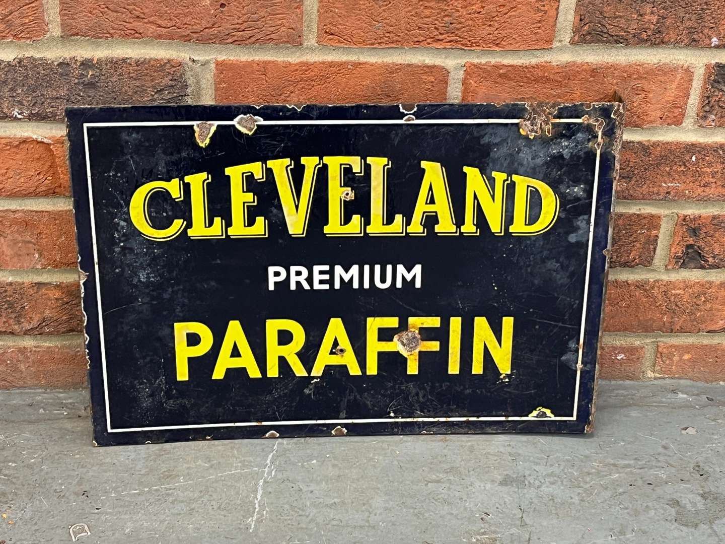 <p>Cleveland Paraffin Enamel Flange Sign</p>