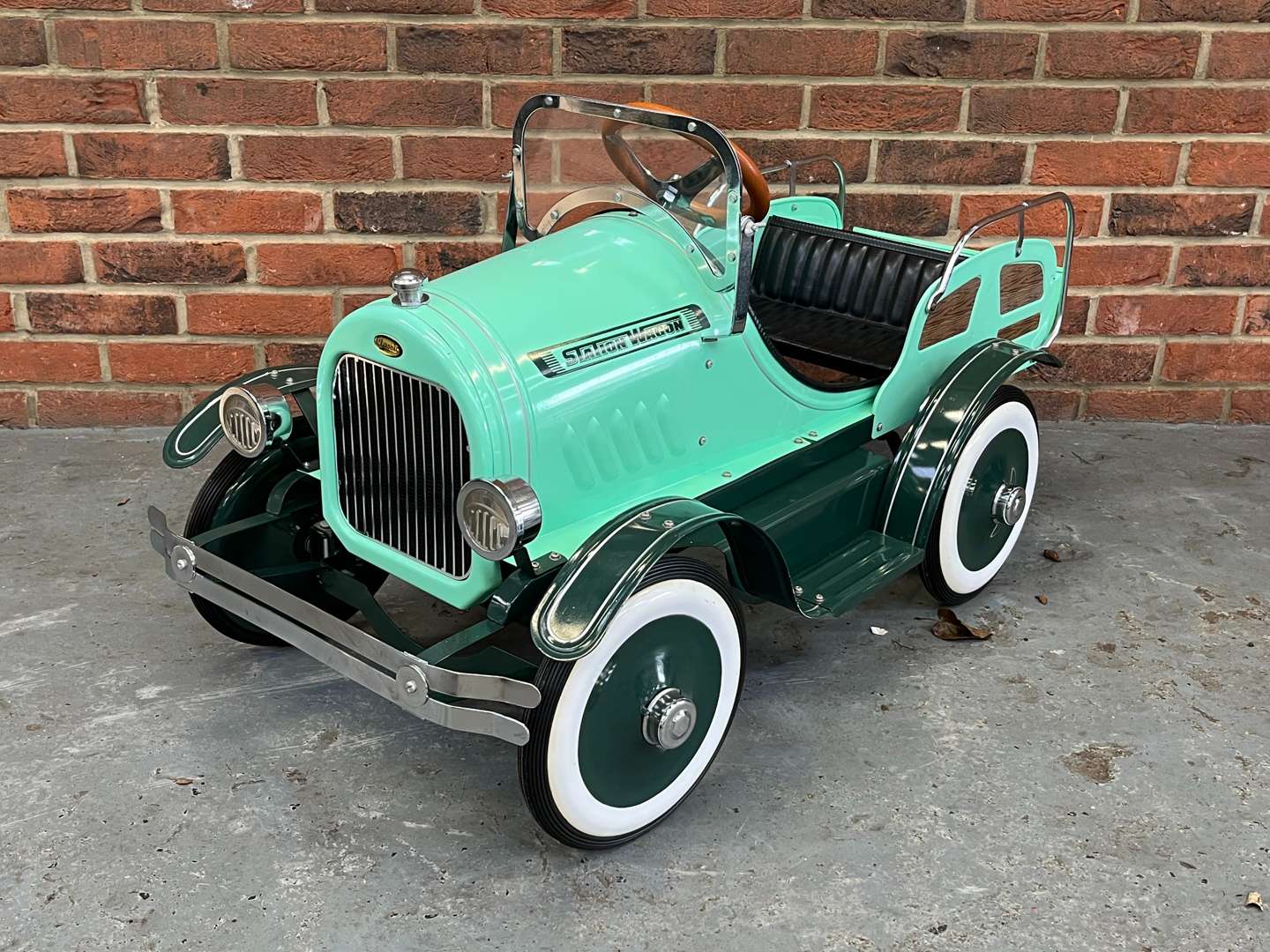 <p>Station Wagon Tin Plate Childs Pedal Car</p>