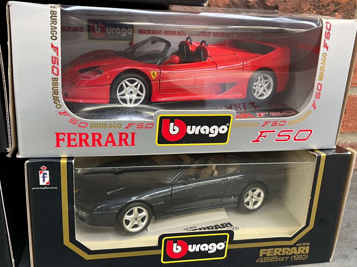 <p>Five Boxed Burago Model Cars</p>