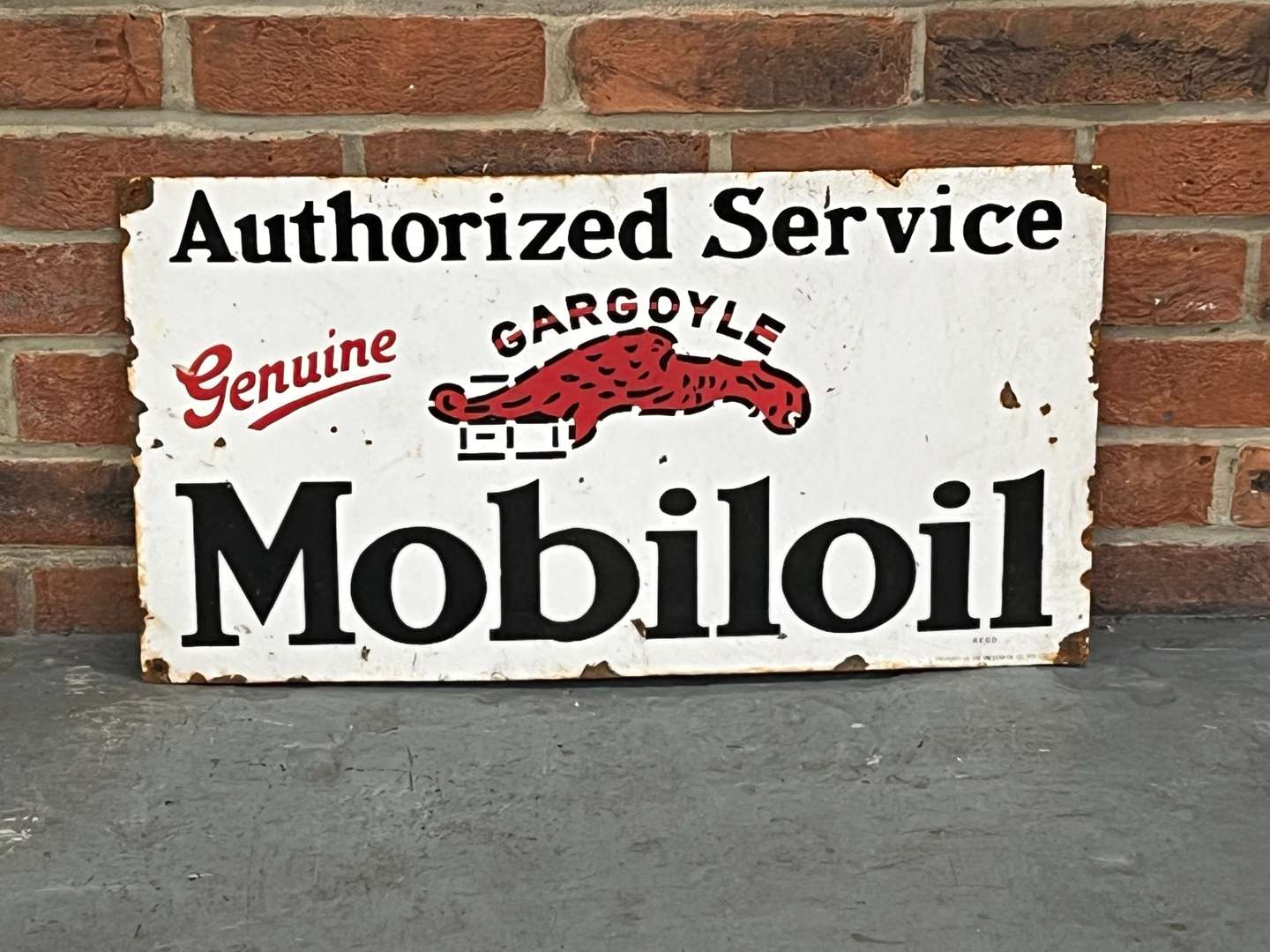 <p>Gargoyle Mobiloil Authorized Service Enamel Sign</p>