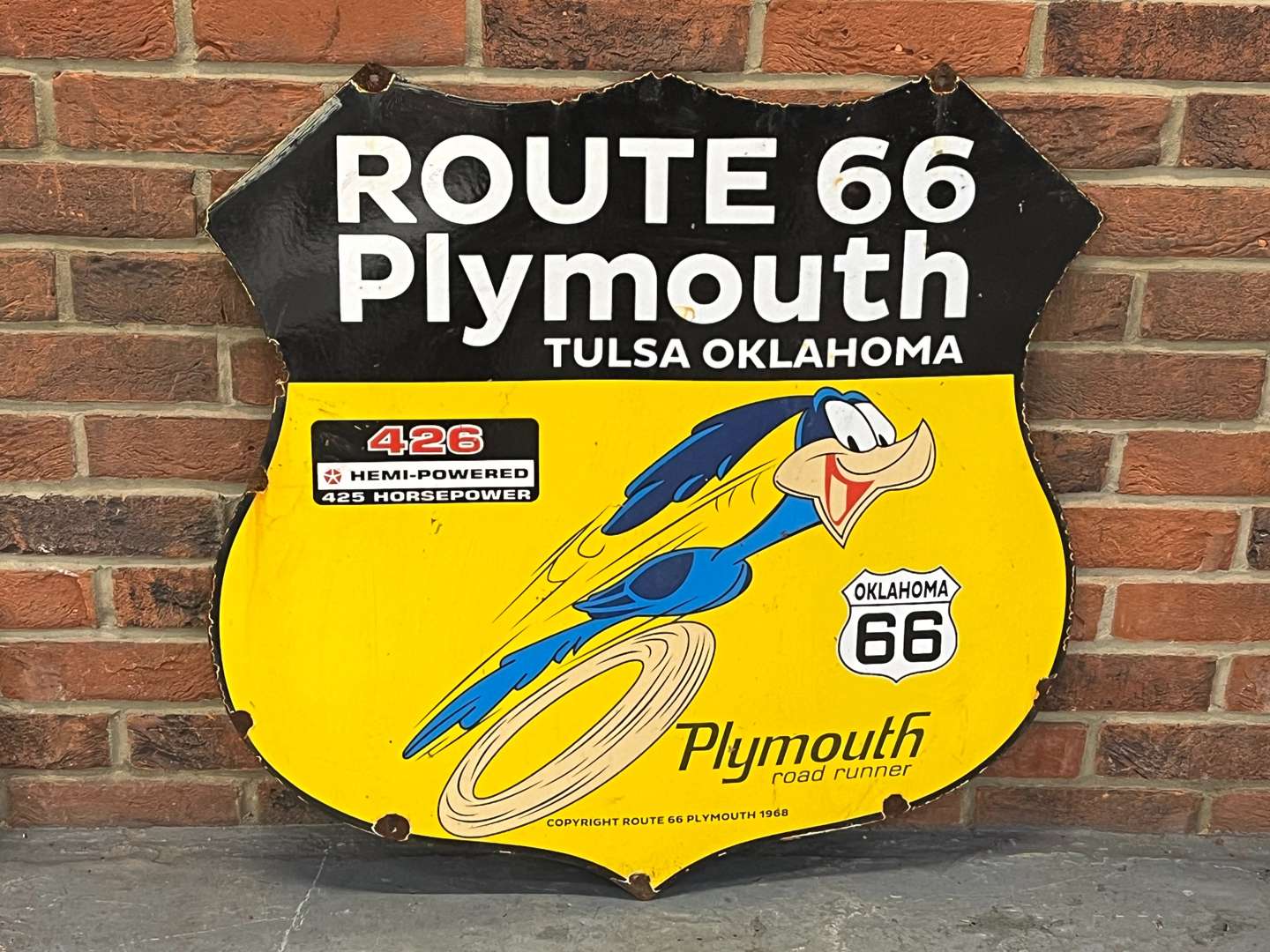 <p>Plymouth Road Runner Enamel Shield Sign</p>