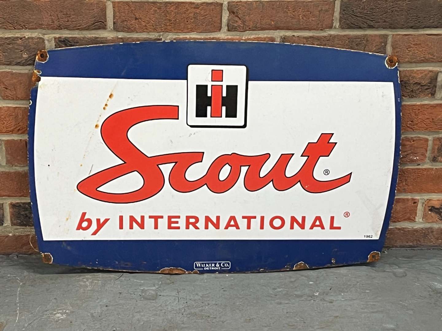 <p>Scout By International Enamel Sign</p>