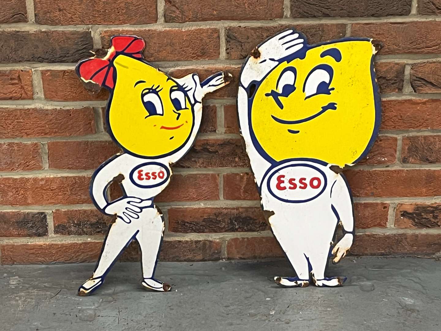 <p>Esso Mr and Mrs Drips Enamel Signs</p>