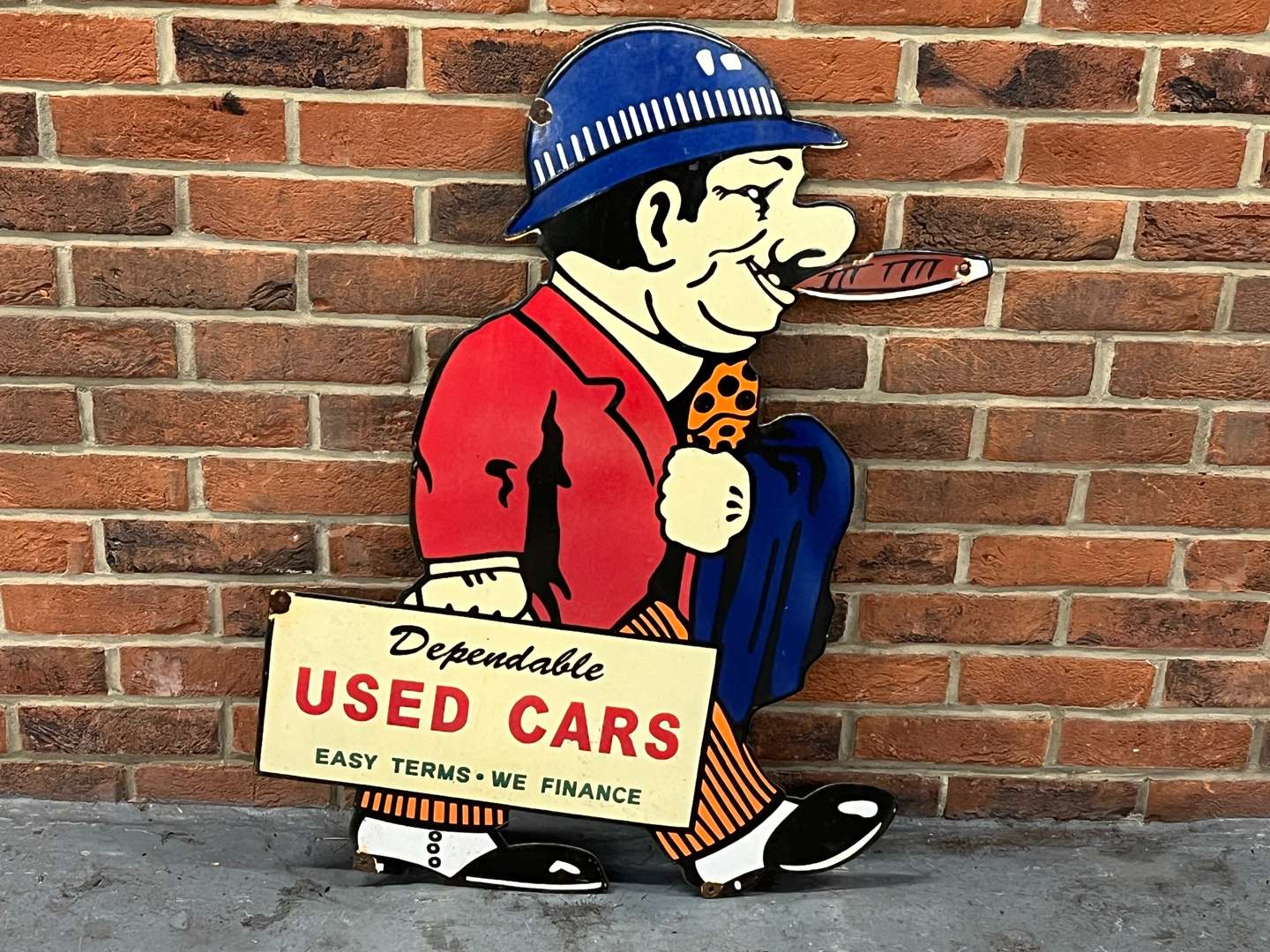 <p>Dependable Used Car Salesman Enamel Sign</p>