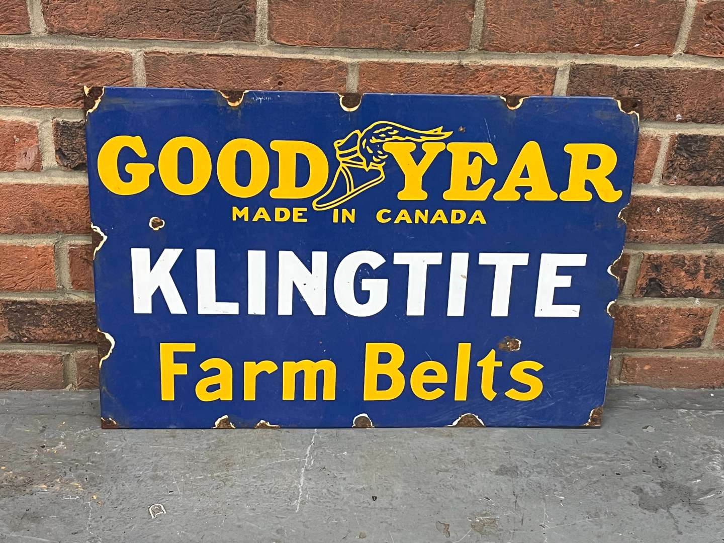 <p>Goodyear Klingtite Farm Belts Enamel Sign</p>