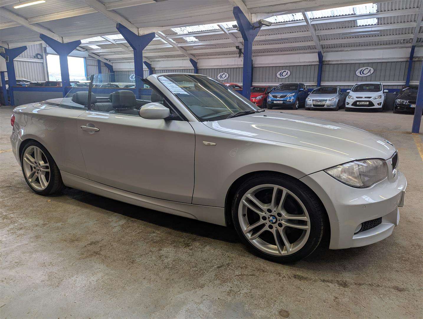 <p>2009 BMW 120I M SPORT</p>