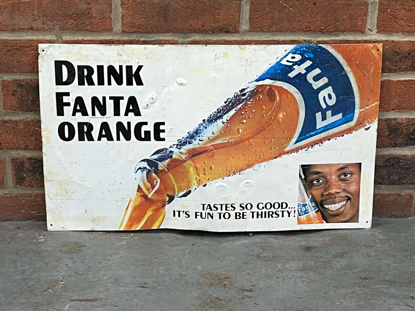 <p>Drink Fanta Orange Tin Sign</p>