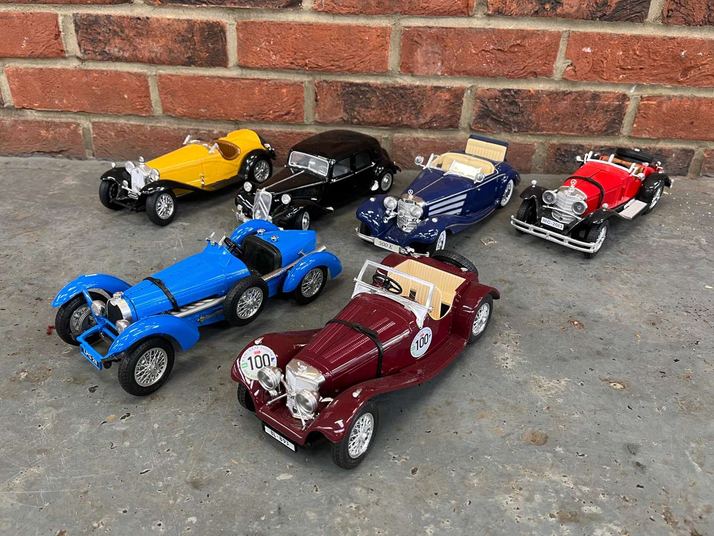 <p>Six Maisto and Burago Model Cars</p>