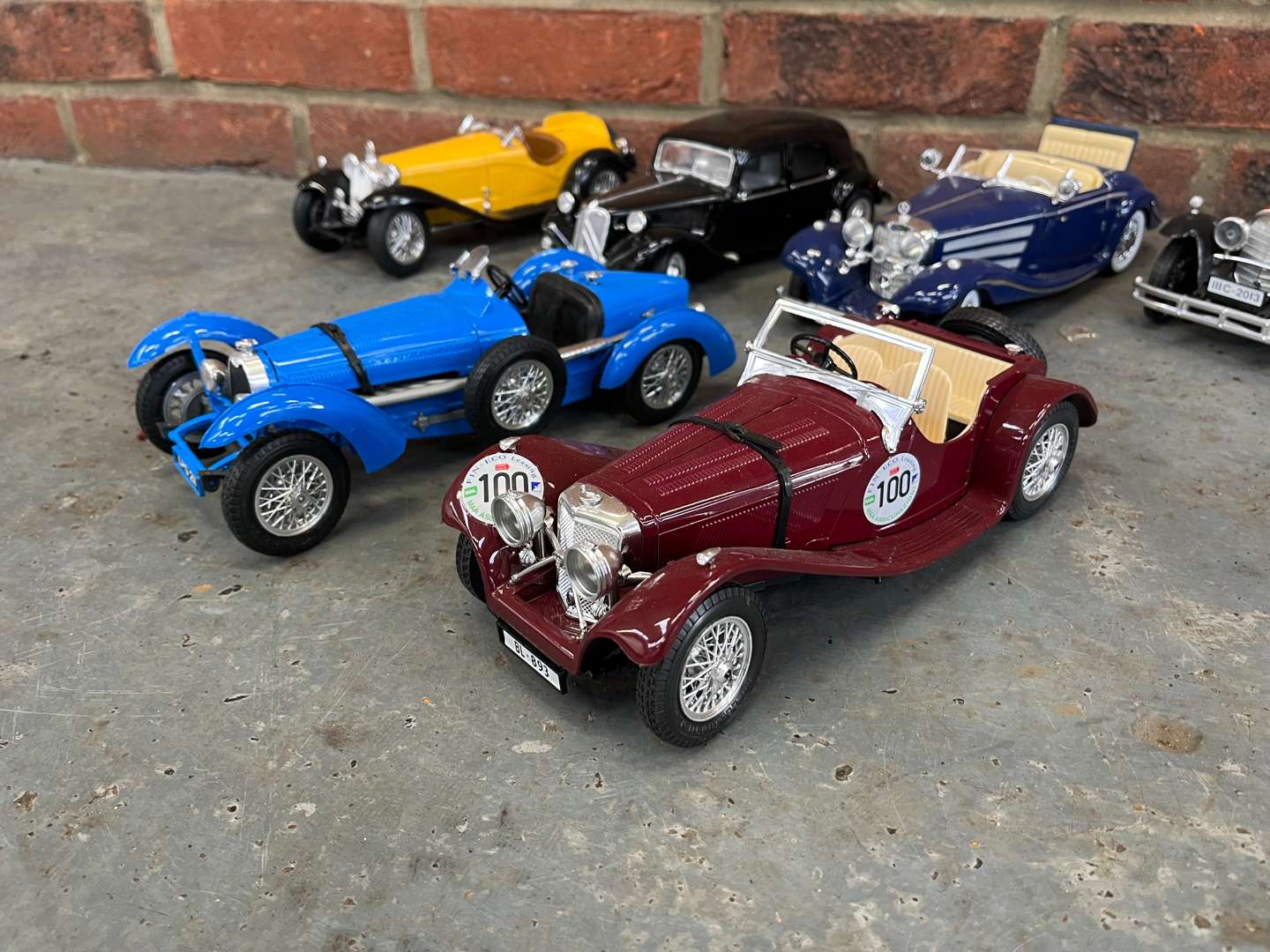 <p>Six Maisto and Burago Model Cars</p>