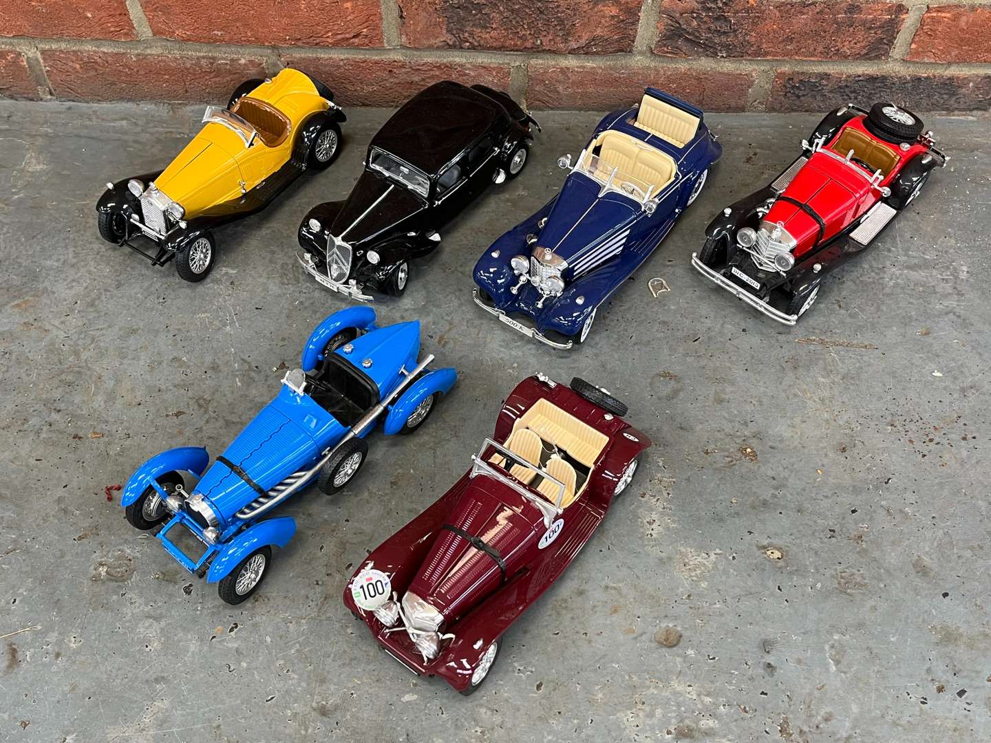 <p>Six Maisto and Burago Model Cars</p>