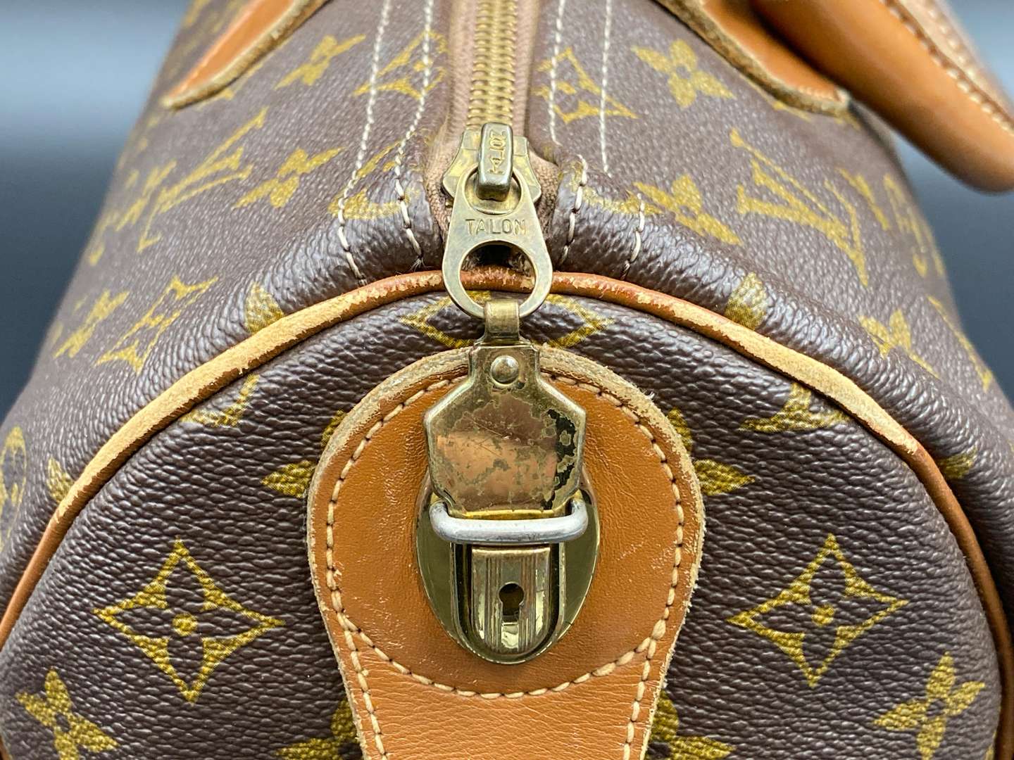 <p>LOUIS VUITTON, Speedy 35, monogram canvas and stitched leather holdall,</p>
