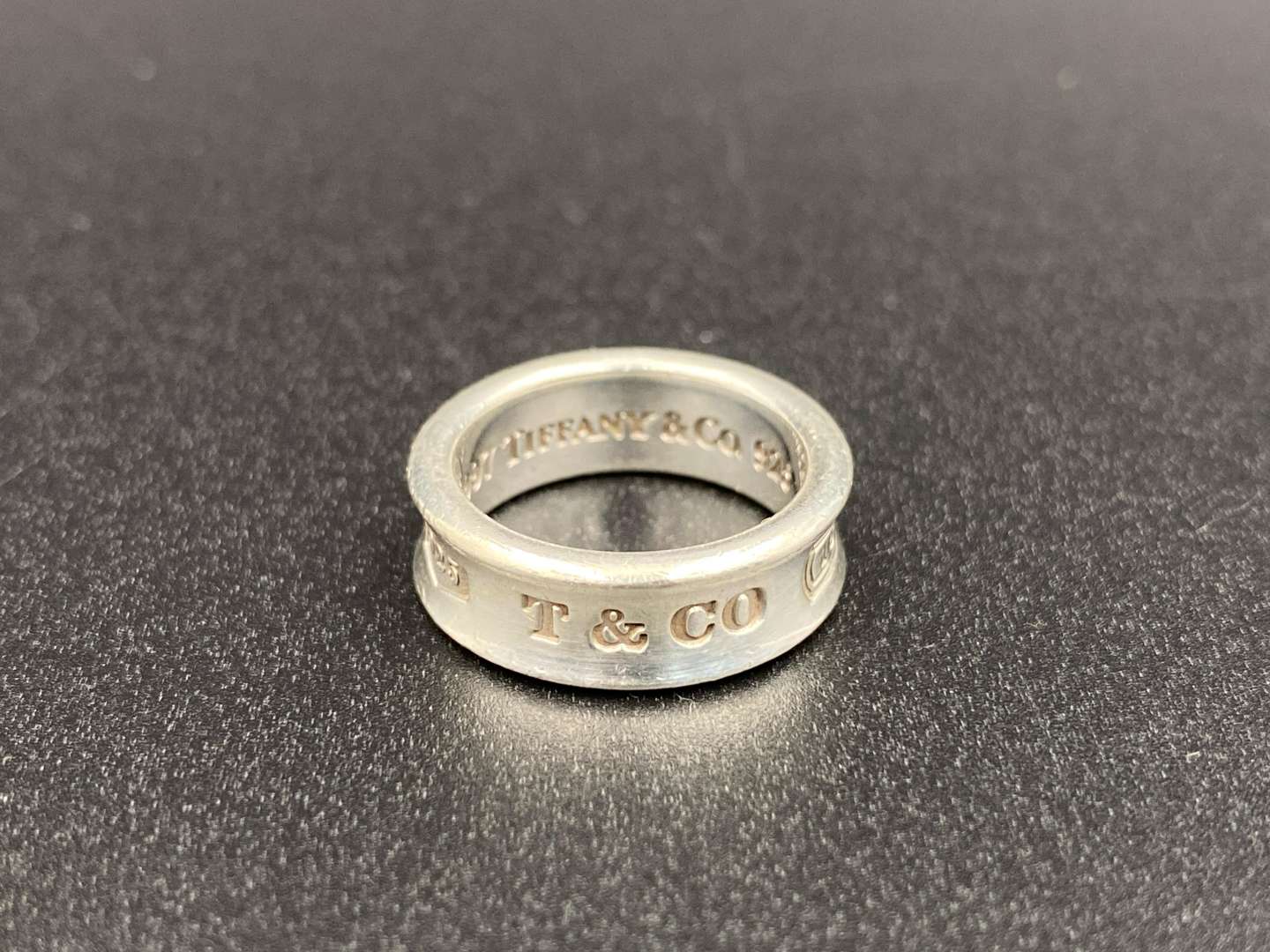 <p>TIFFANY & CO, .925 silver, silver “Tiffany 1837” concave ring,</p>