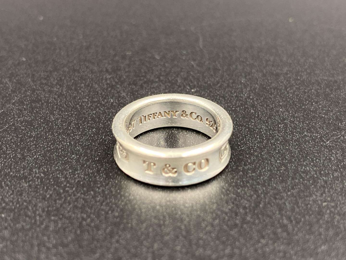 <p>TIFFANY & CO, .925 silver, silver “Tiffany 1837” concave ring,</p>