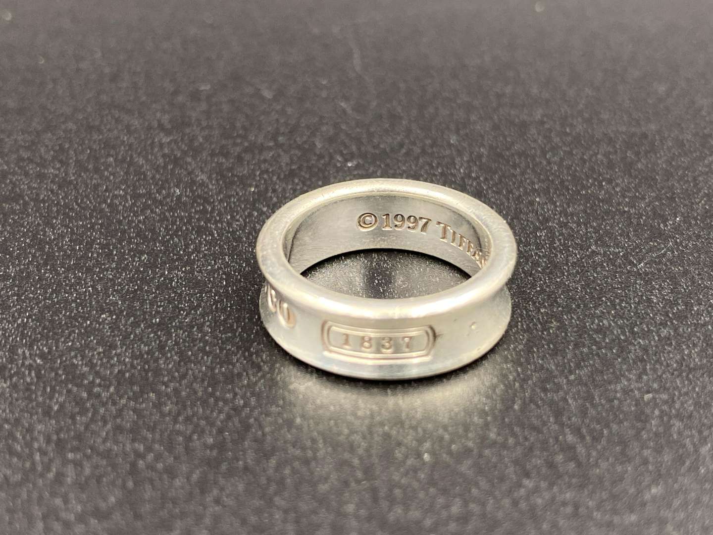 <p>TIFFANY & CO, .925 silver, silver “Tiffany 1837” concave ring,</p>