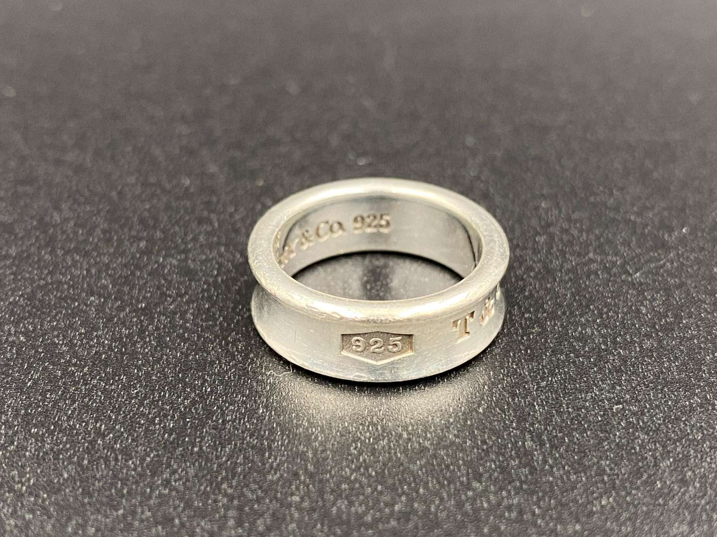 <p>TIFFANY & CO, .925 silver, silver “Tiffany 1837” concave ring,</p>